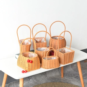 Woven wicker flower baskets with waterproof liners in various shapes for home decoration