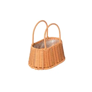 Orange-brown woven flower basket with double handles and waterproof plastic liner