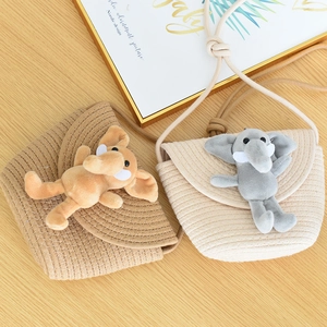 Children's woven straw crossbody bag set featuring cute plush elephant decor for beach use