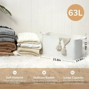 Detail of 63L white woven cotton rope basket showing 21.6x14.9x11.8in size and soft tassel