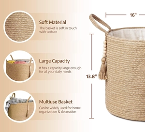 Detailed view of handmade cotton rope storage basket with wood bead tassel and handles