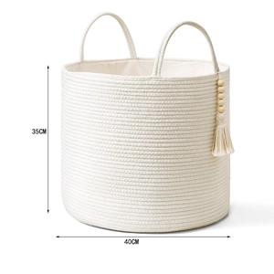 Close-up of woven cotton rope basket featuring 35cm height and wooden bead tassel decor