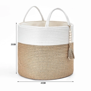 Detail view of cotton rope laundry basket with size labels 35x40cm and tassel decor