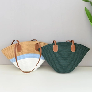 Detail view of woven bohemian tote bags with premium leather handles in various colors