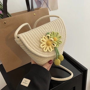 Exquisite woven flower crossbody bag for women in cream white with floral charm decoration