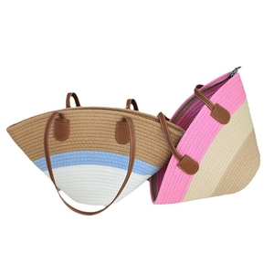 Bohemian woven cotton tote bag with leather handles and colorful striped pattern