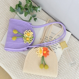 Handmade woven cotton rope handbags in purple and beige featuring 3D daisy flower decorations