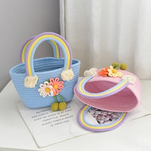 Detailed view of woven basket bags with rainbow handles and delicate floral charms