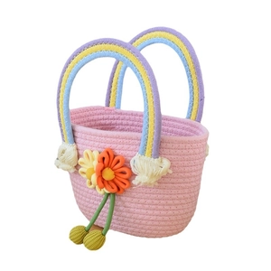 Pink woven straw tote bag for girls with rainbow handles and 3D sunflower decoration