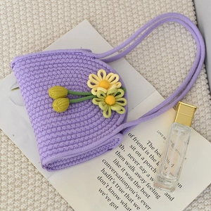Handmade purple woven cotton rope handbag with floral knit decorations for women
