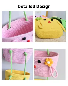 Detail of woven cotton storage baskets featuring cartoon animal faces and floral charms