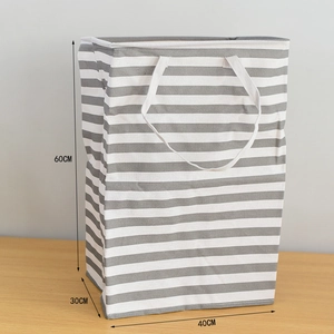 Detailed dimension view of large waterproof grey striped laundry basket showing 60cm height