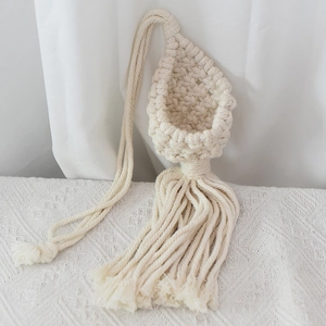 Handmade bohemian cotton rope woven wall hanging basket with long decorative tassels