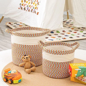 Set of two bohemian hand-woven cotton rope storage baskets with handles for kids toys