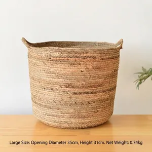 Detail view of large woven plant basket with handles, diameter 35cm and height 31cm