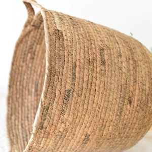 Detailed macro shot of high-quality woven natural fiber basket with fine spiral texture