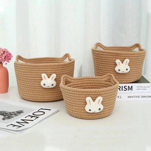 Three-piece set of woven cotton rope baskets with cute bunny ears and plush rabbit patches