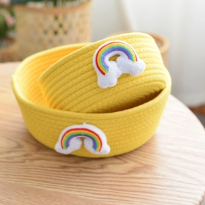 Set of two yellow rainbow cotton rope woven storage baskets for desktop organizing