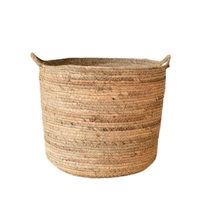 Handwoven Nordic seagrass planter basket with dual handles for luxury home decor