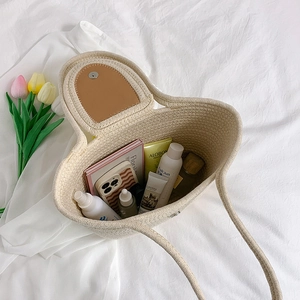 Chic beige woven cotton tote bag with leather flap and large capacity for essentials