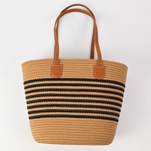 Striped woven tote bag with brown leather handles and khaki textured finish