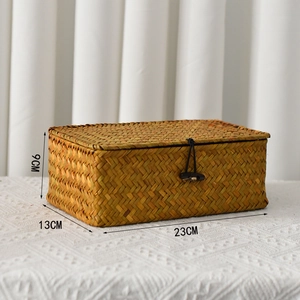 Handwoven seagrass storage box with lid and secure clasp, size 23cm by 13cm by 9cm
