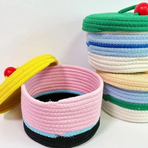 Colorful cotton rope woven storage baskets with lids and decorative red ball handles
