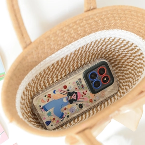 Clear phone case with cartoon character design inside a brown woven straw tote bag