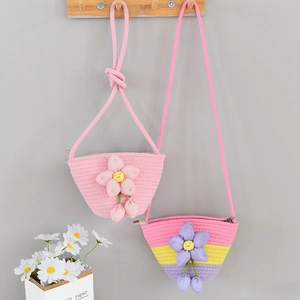 Mini woven cotton bucket bags with 3D flower decoration and adjustable shoulder strap