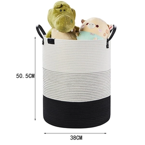 Detail of woven storage basket with leather handles and height markings for toy storage