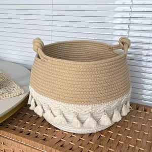 Woven Nordic laundry basket with cotton rope, two-tone tassels and top handles for storage