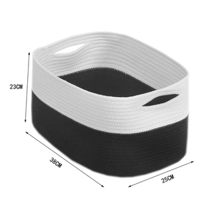 Detail view of woven cotton rope storage basket in black and white with 38x25x23cm size mark