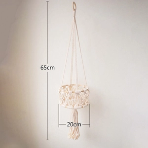 Detail view of woven cotton hanging basket with 65cm height and 20cm diameter dimensions