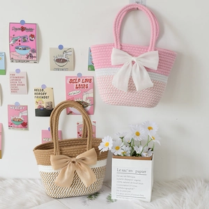 Handmade striped cotton rope tote bag with large bow decor for summer beach holidays
