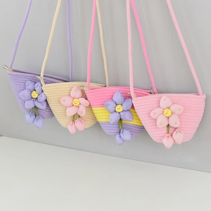Mini cotton woven bucket bags with 3D floral accents in purple, beige, and pink colors