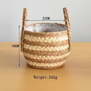 Detail of hand-woven seagrass basket with inner liner, measuring 22cm by 18cm