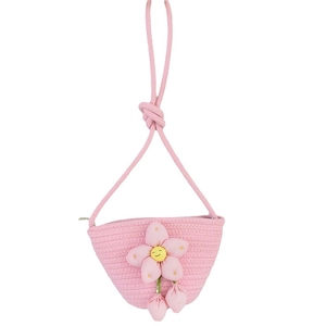 Pink handwoven cotton bucket bag for girls with a large smiley flower and crossbody strap