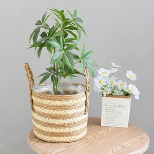 Close-up of handwoven straw basket with waterproof plastic liner and striped pattern