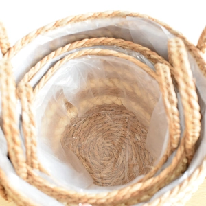 Three-piece set of woven seagrass plant baskets with waterproof plastic inner lining
