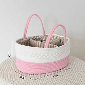 Handwoven cotton rope storage basket with white-pink contrast and striped inner lining