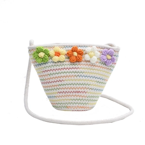Handmade woven crossbody bag for kids with colorful crochet flowers and white cotton rope