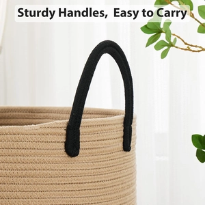Close-up of sturdy black reinforced handles on a Nordic woven cotton linen storage basket