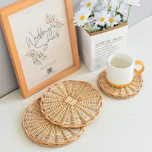 Macro view of woven round heat-resistant placemat with natural rattan texture