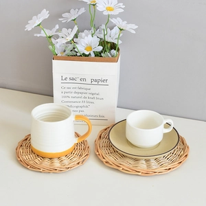 Close-up of heat-resistant woven placemats in a minimalist Nordic home setting