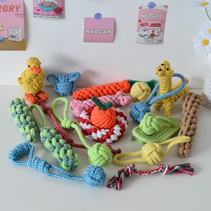 Detailed view of durable braided cotton rope pet toys in various colorful animal shapes