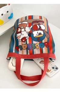 Top view of striped canvas bucket bag showing inner space with baseball cat illustration