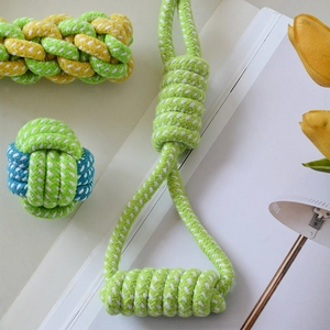 Detailed view of durable braided cotton rope dog toys for chewing and cleaning teeth