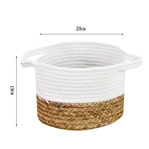 Close-up of 25cm woven basket made of white cotton rope and natural seagrass textures