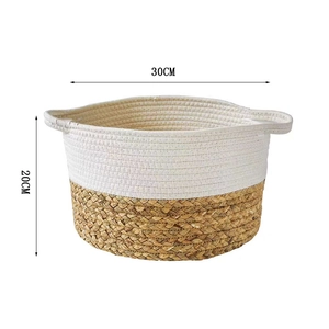 Detail of 30x20cm woven basket with two-tone cotton rope and seagrass texture