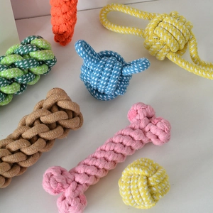 Detailed top view of various colorful braided cotton rope chew toys for dogs in different shapes